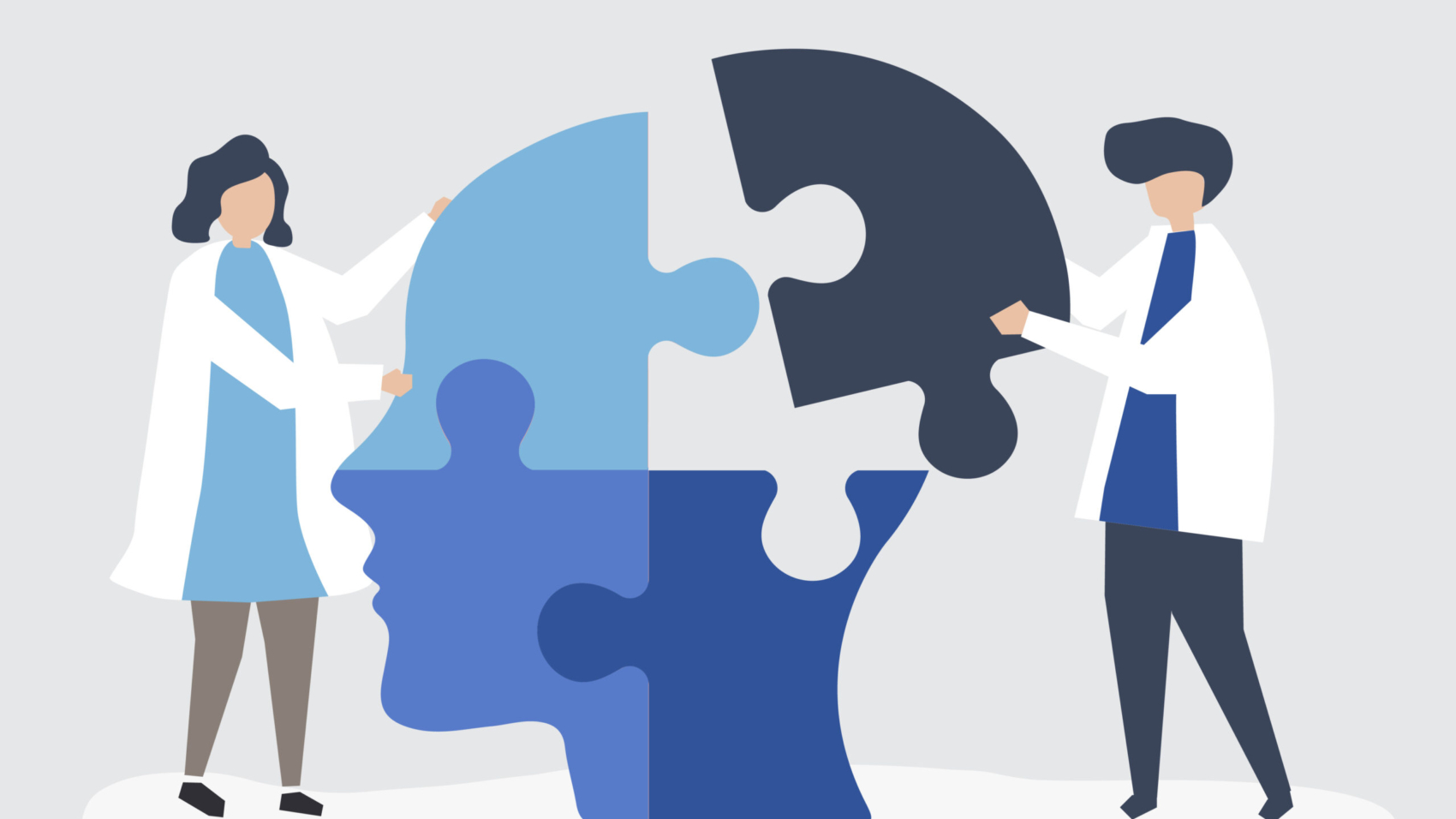 People connecting jigsaw pieces of a head together